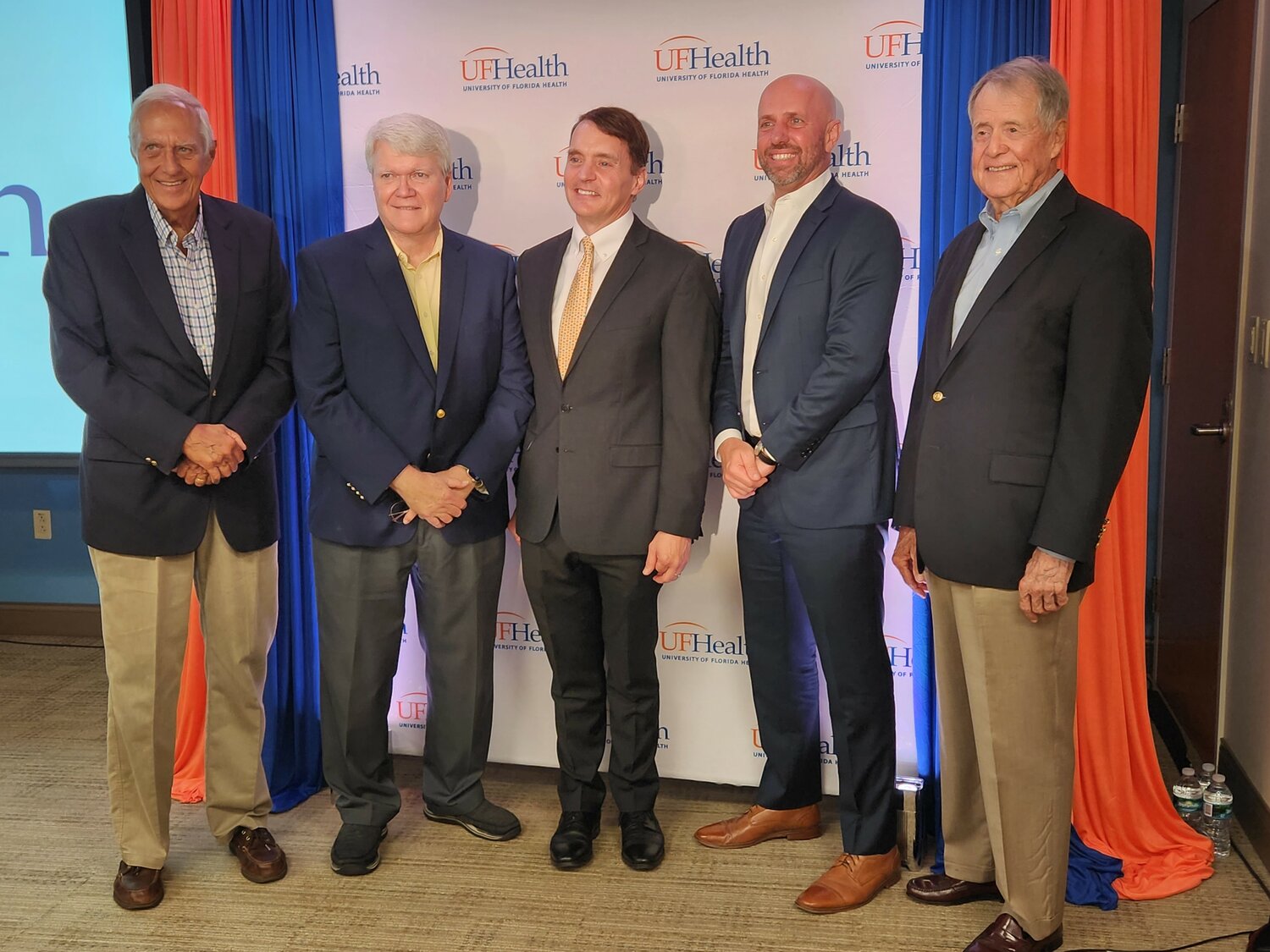 Carlton DeVooght, CEO of Flagler Health+ and members of the organization’s board were on hand as its merger with UF Health was made complete with a public announcement on Sept. 13.